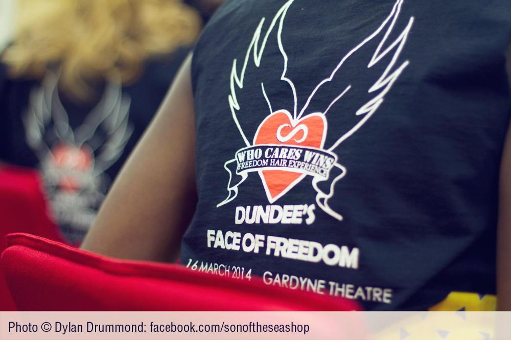 The Who Cares Wins Logo on the model's t-shirts (photo by Dylan Drummond)